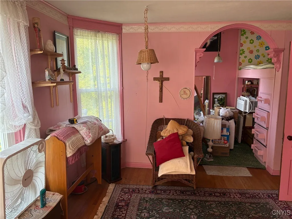 2nd floor sitting area attached to bedroom with built-in loft bed