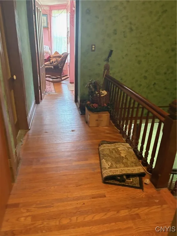 2nd floor landing with hardwood floors