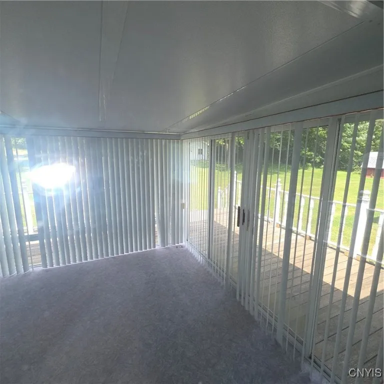 3 Season Room. Sliders to deck.