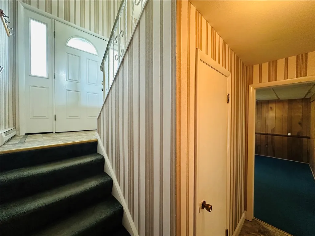 The stairs leading to the first floor.