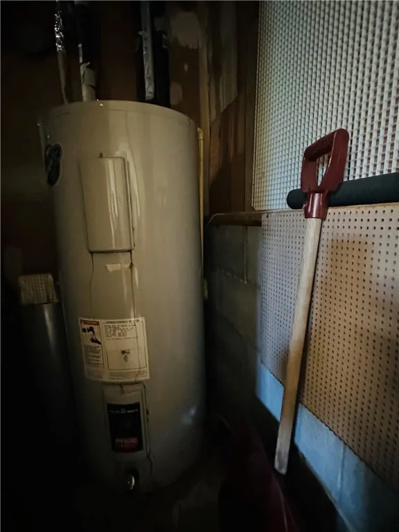 The hot water heater is located in the back corner of the garage.