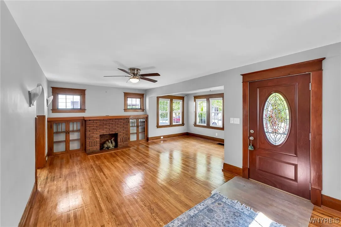 Natural light throughout this home. Beautiful built-ins in living room.