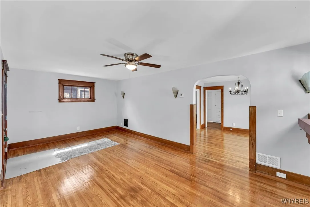 Living room looking into dining room.