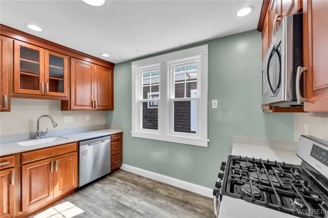 Kitchen with beautiful, modern cabinets. All appliances stay.