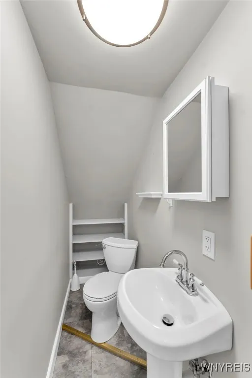 Upstairs half bath.