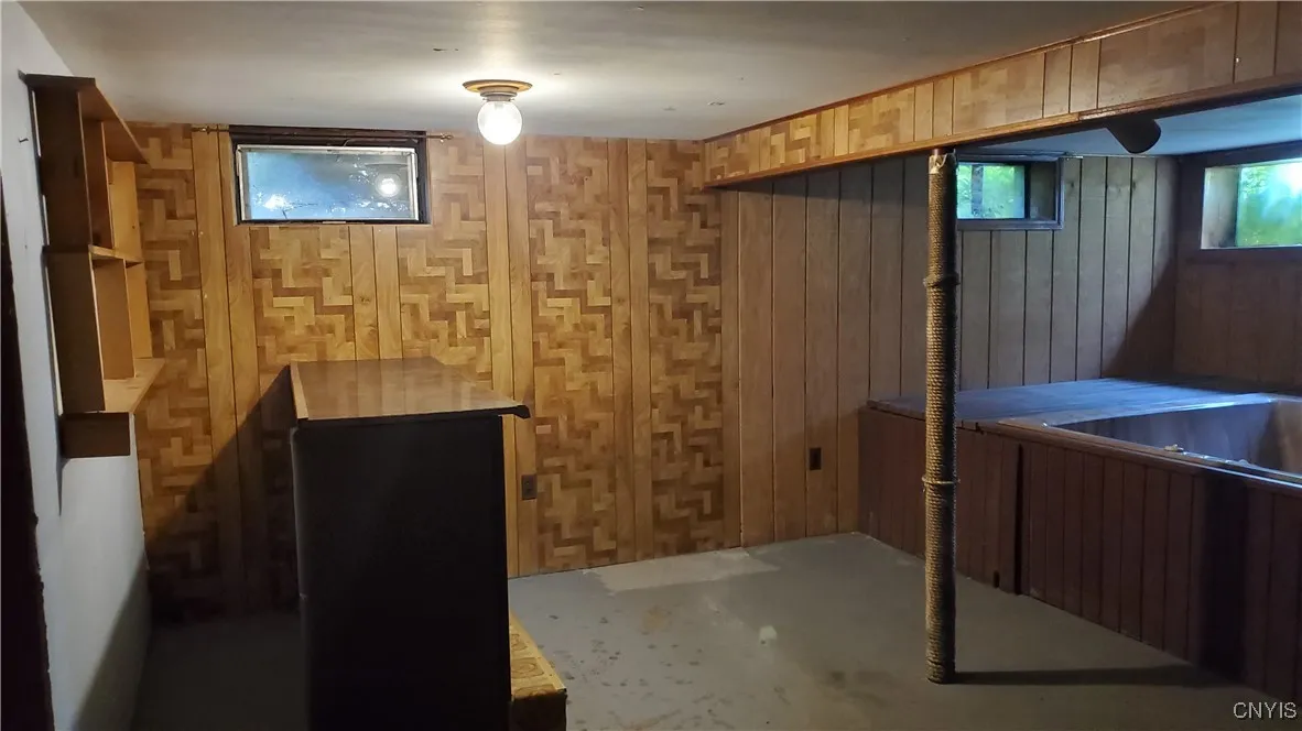   Your basement has a dry bar, and a hot tub on the right.