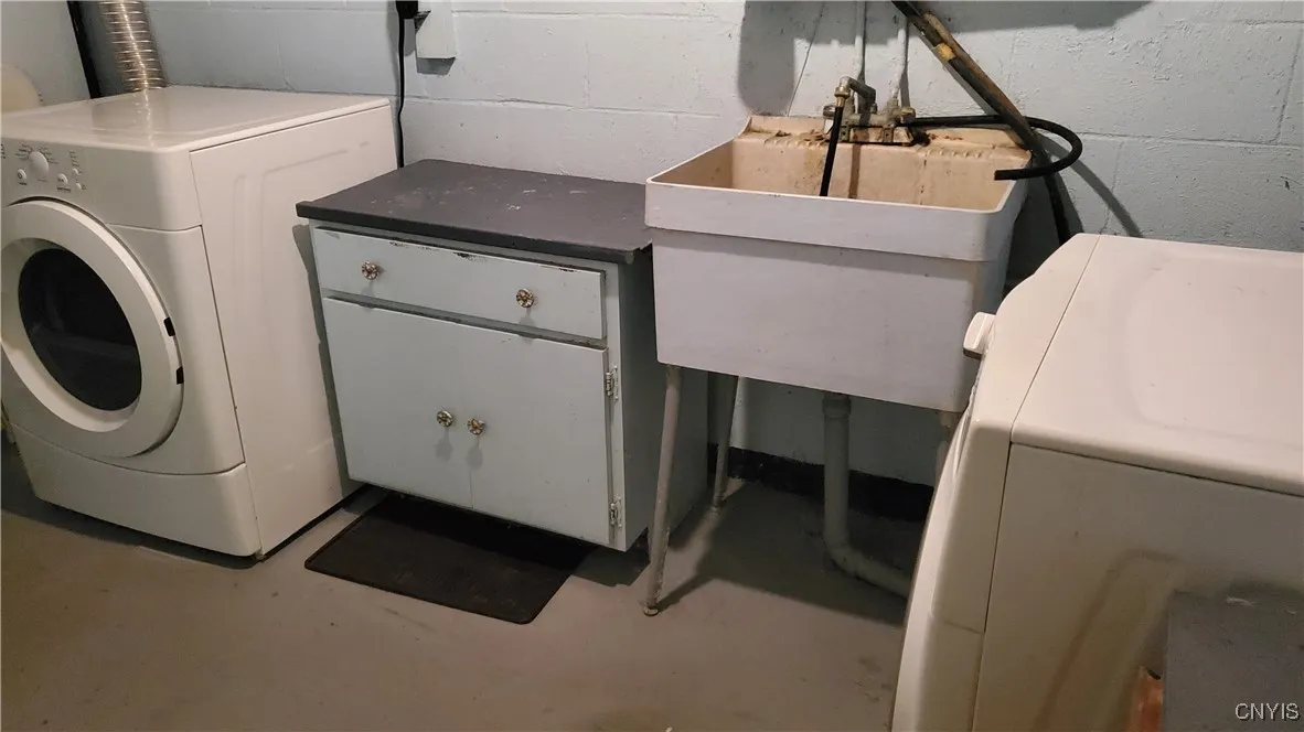   Laundry with washer and dryer staying