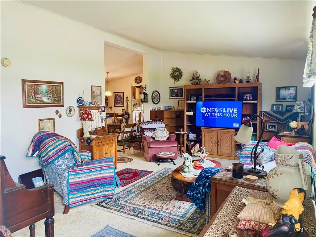 Family room looking onto kitchen and dining room