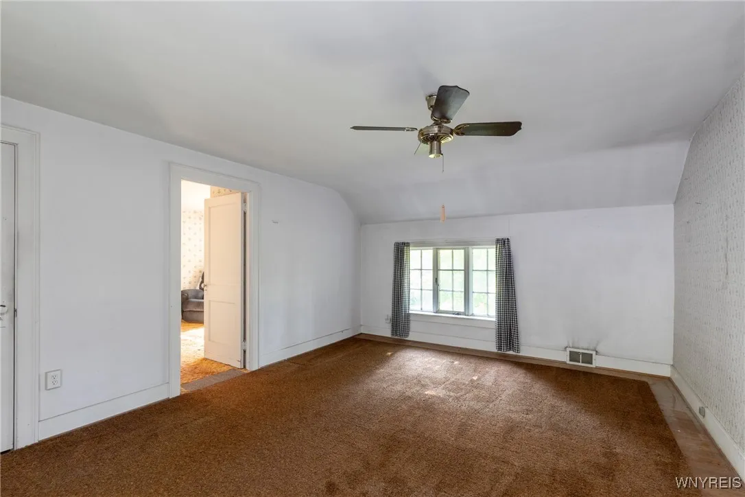 Generously sized primary bedroom.
