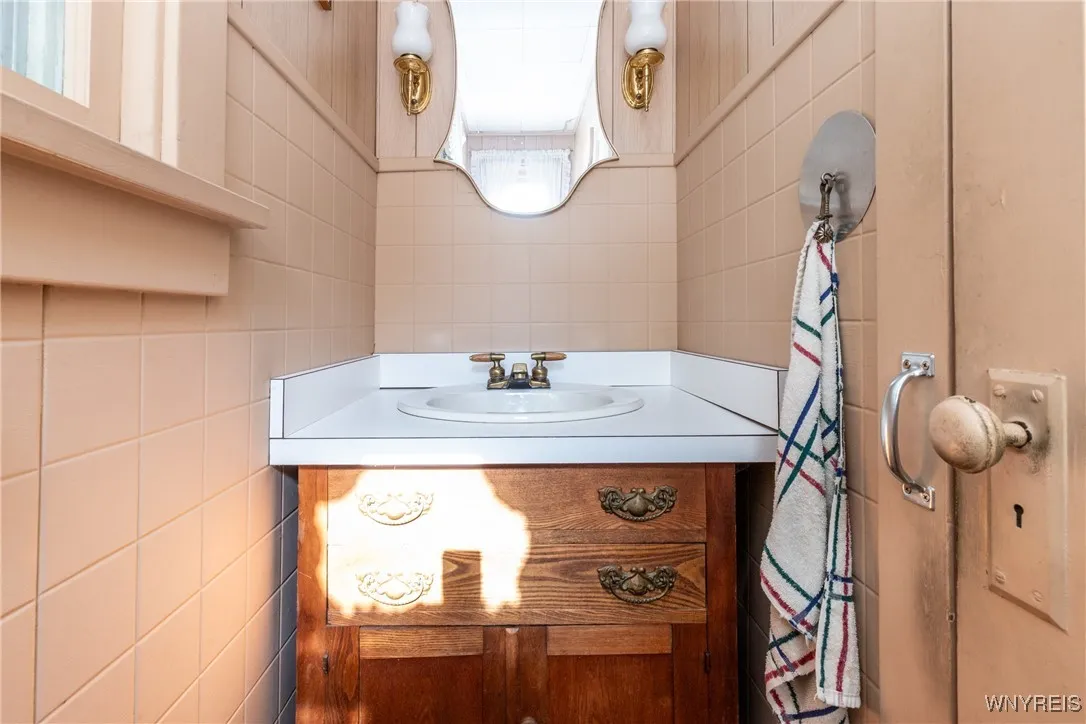 There is the convenience of a half bath on the first floor.