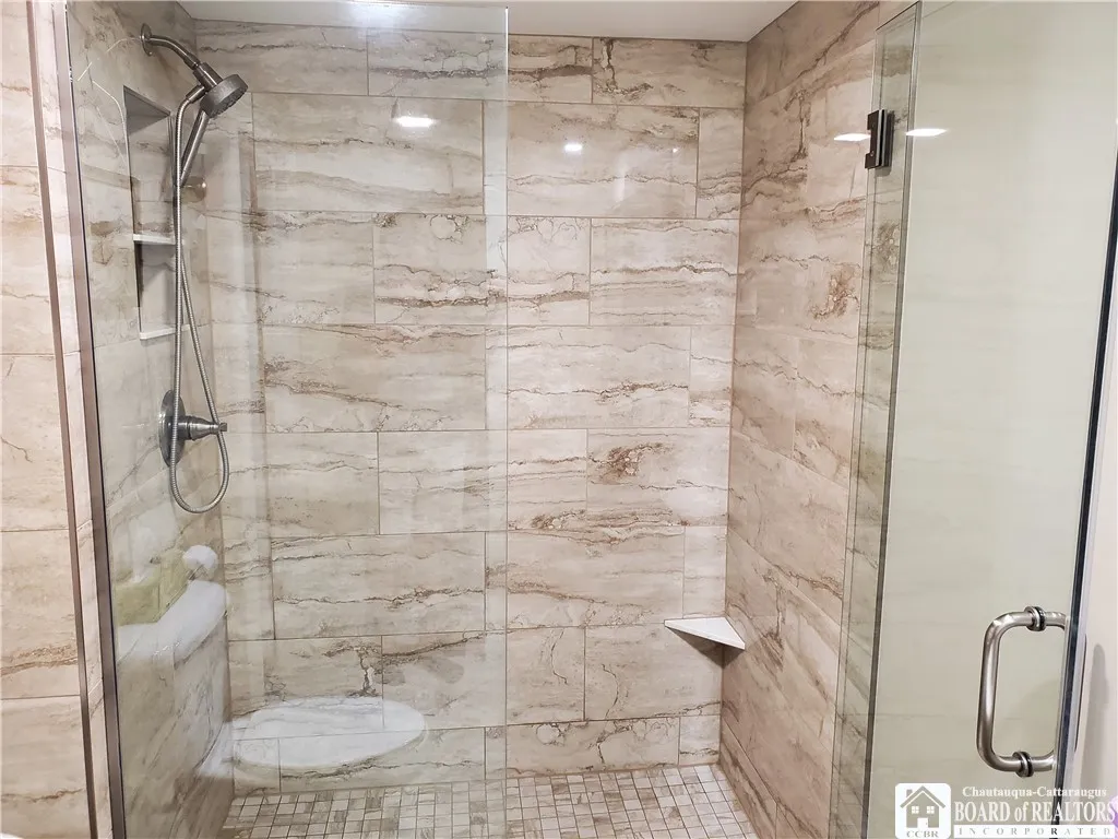 Full Bathroom  1st floor all tiled and glass