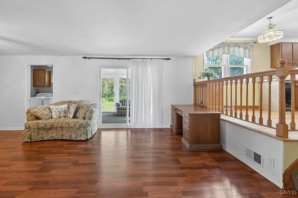 Back family room with a slider to the Florida room
