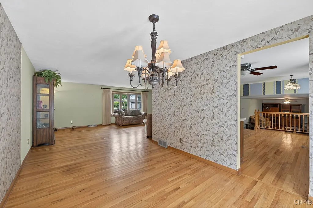 Forma dining room that leads to the kitchen