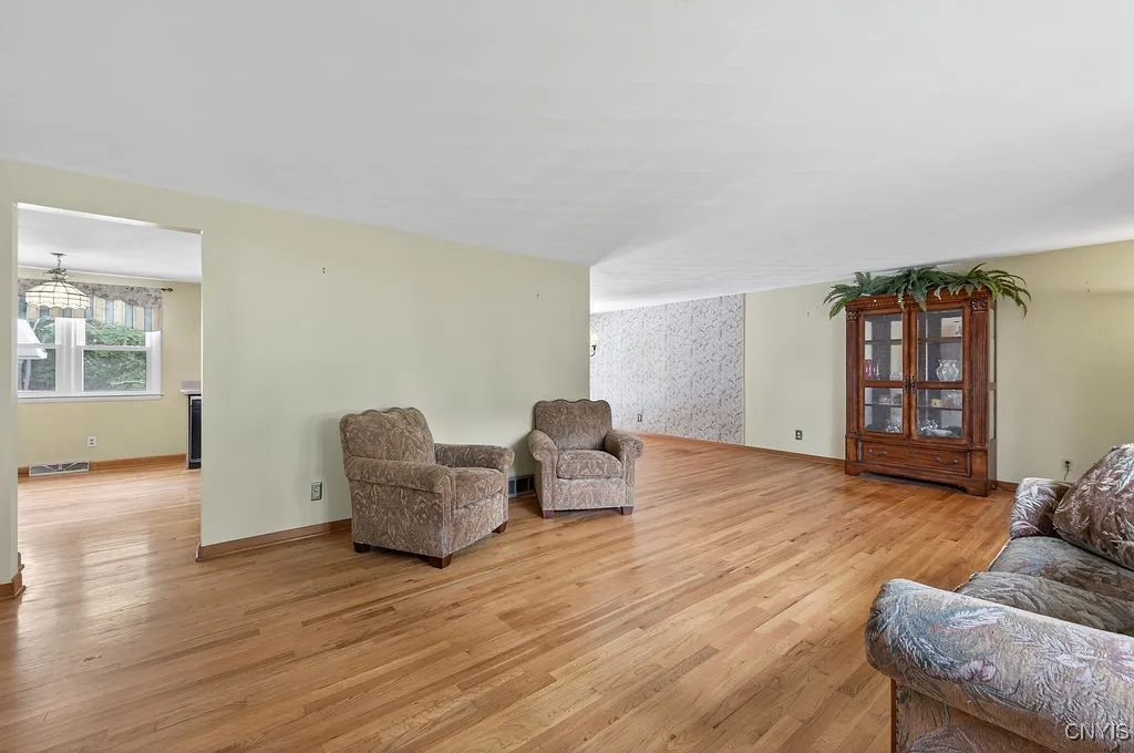 Front living room that leads to the formal dining room