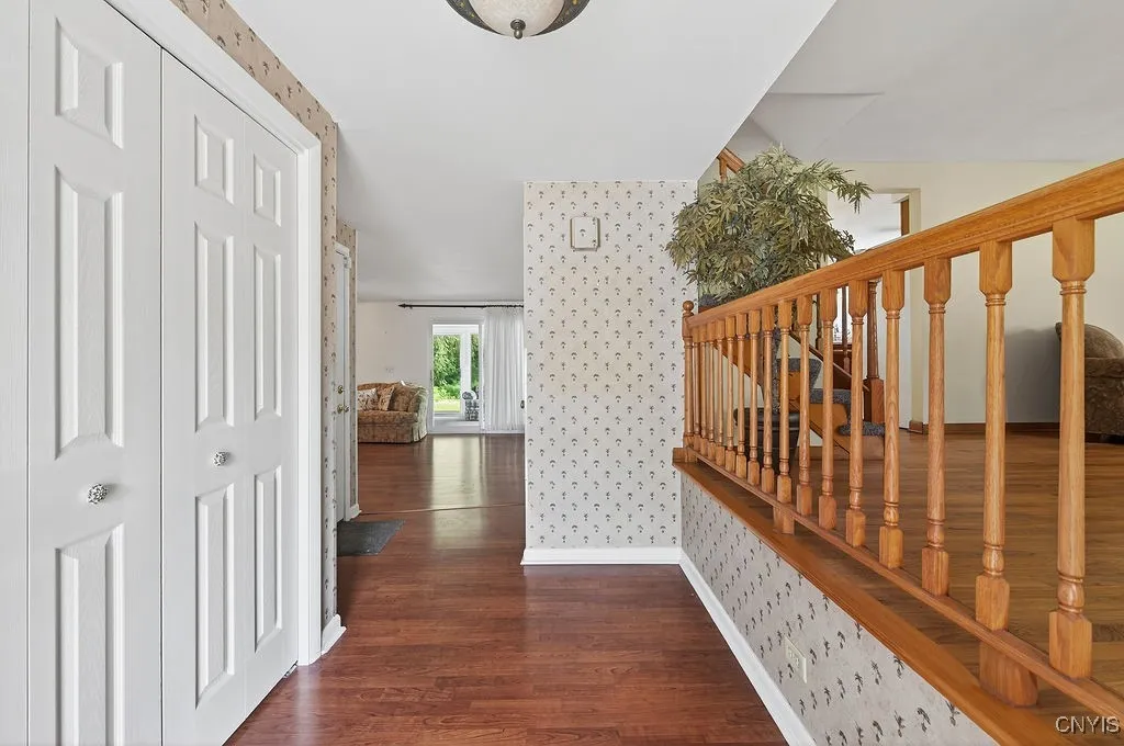 Walk in to a large foyer with a double coat closet.  Leads to front living rm or back living rm