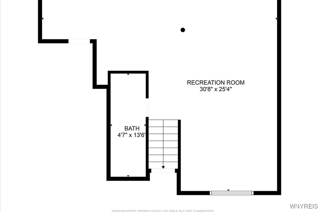 Basement recreation area. Unfinished laundry/storage space not shown