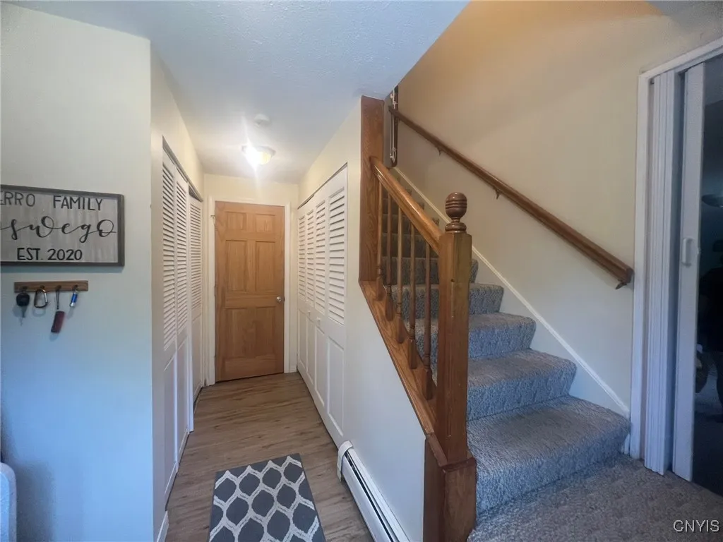 Entry with large closet, also utility closet on the right