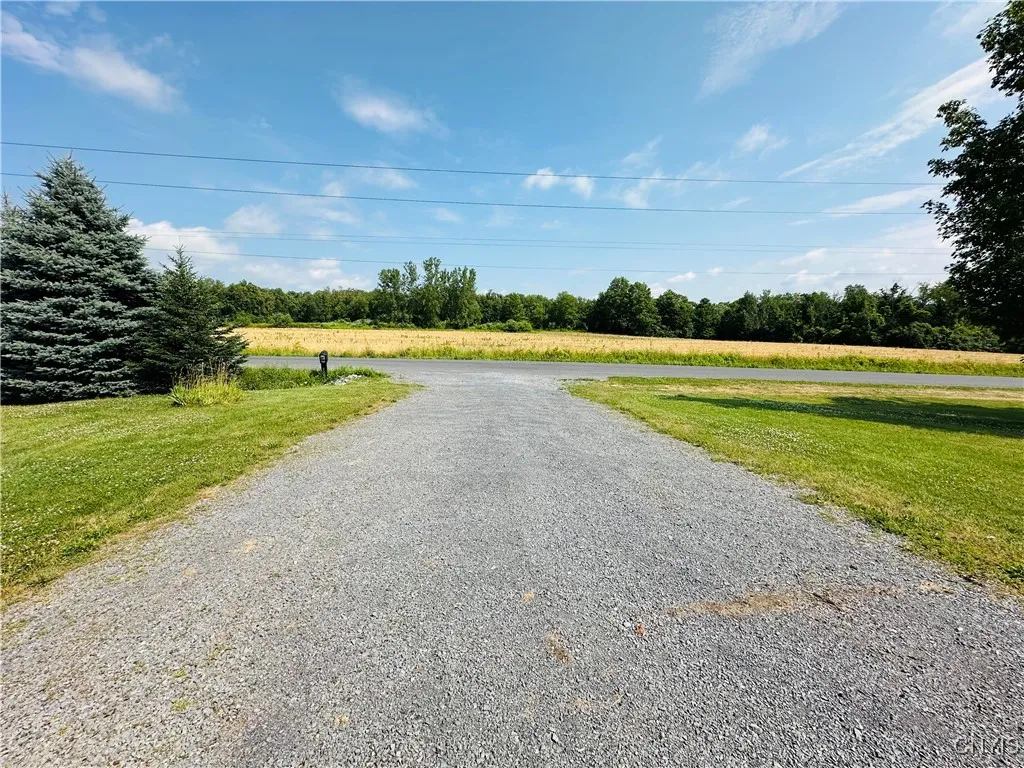 Large driveway. Plenty of room for garage addition.