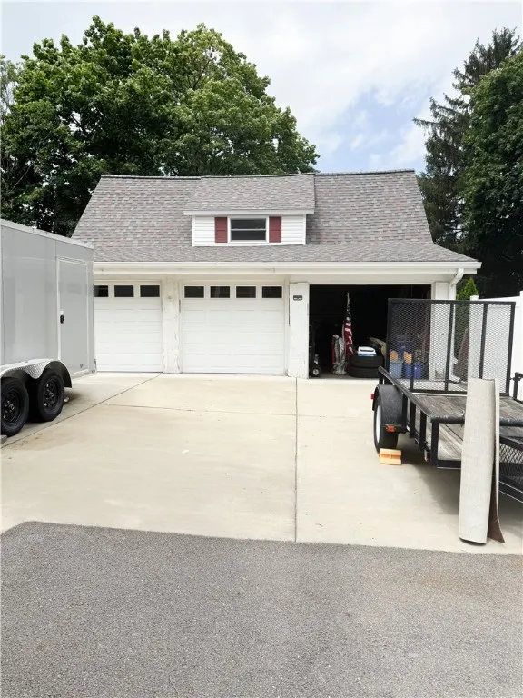 3 Bay Garage with walk-up storage space