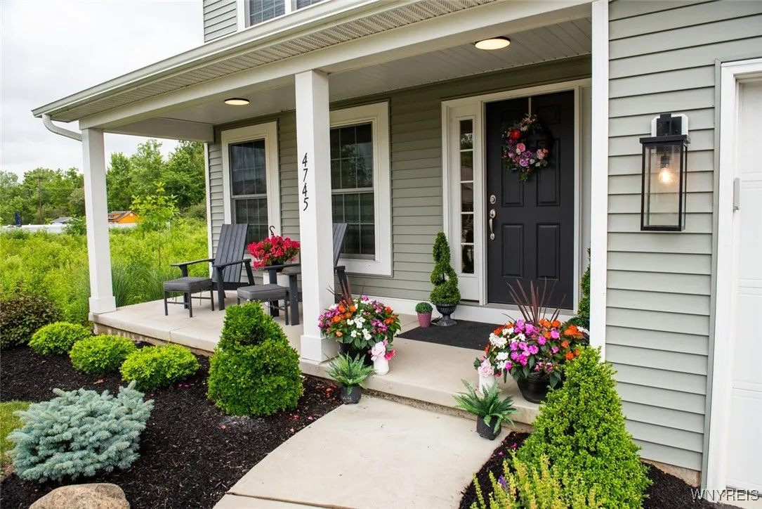 MATURE LANDSCAPING AT FULL FRONT PORCH