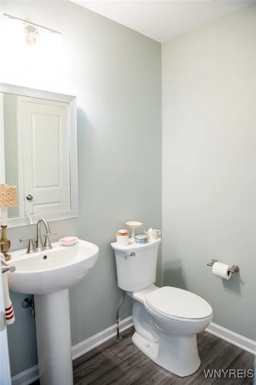 CONVENIENT HALF BATH LOCATED OFF MAIN HALL