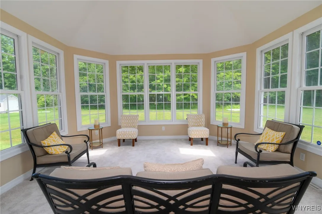 Great morning room or sunroom overlooking the private rear yard