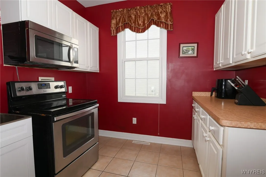First floor laundry was used as an additional cooking area. Laundry attachments are in place.