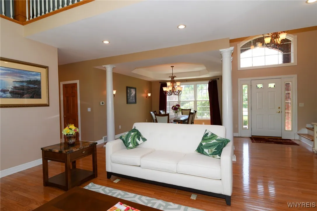 Hardwood floors, open but separate.
