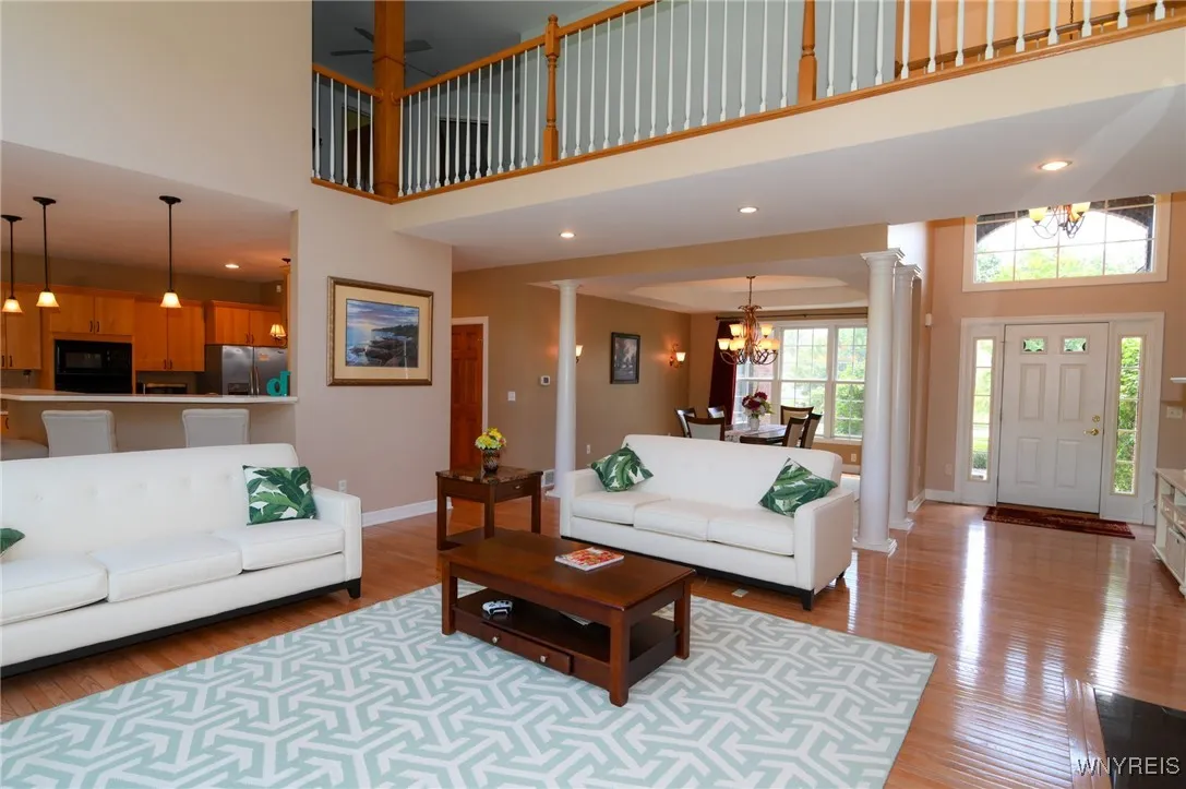 Second floor loft area with three bedrooms, full bath