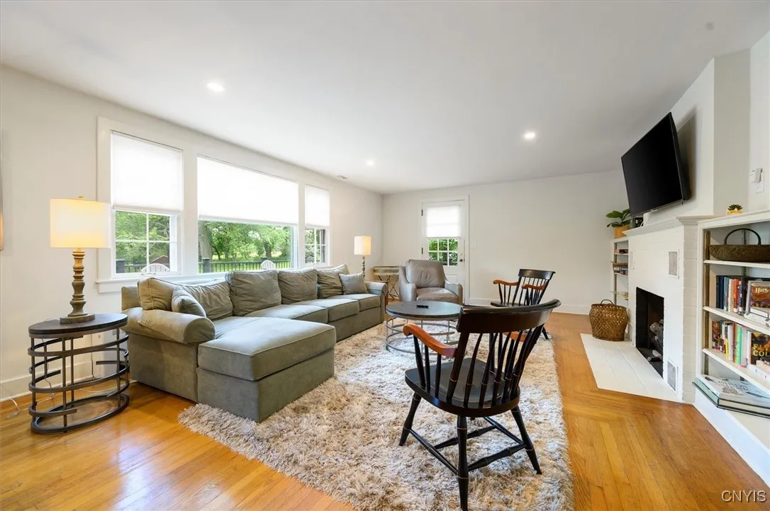 Large Living Room and Dining room looking out on backyard