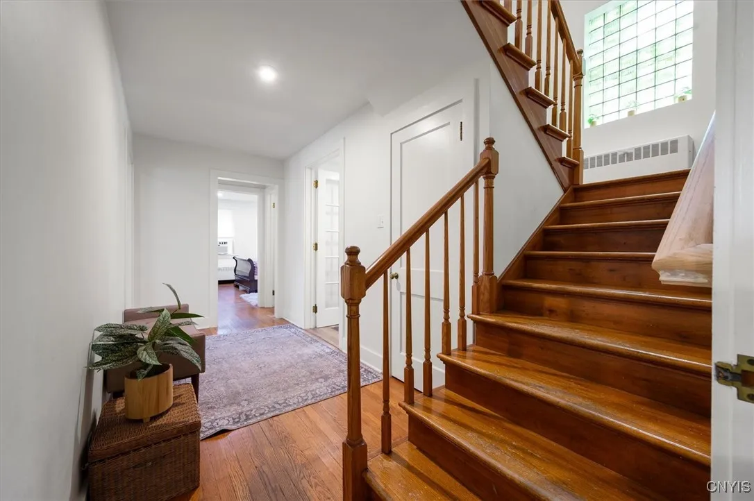 split stair case offers 2nd bedroom off to the right (area over the 2 car garage~