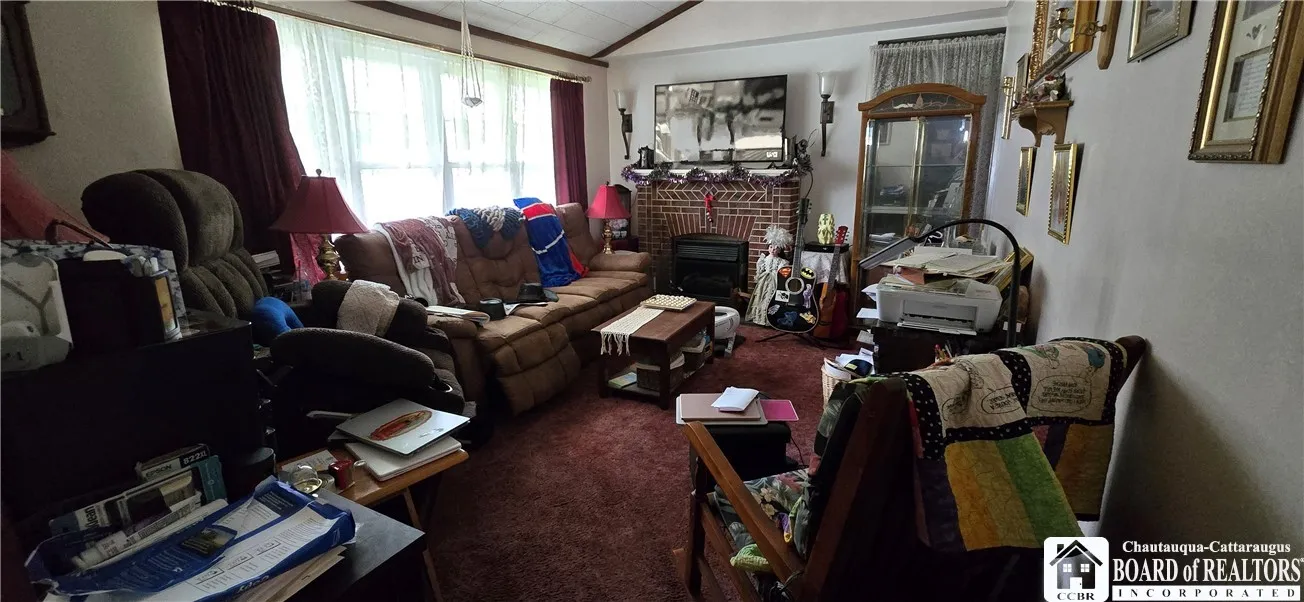 Den with gas fireplace