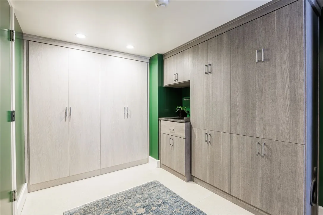 Mudroom with extensive closets