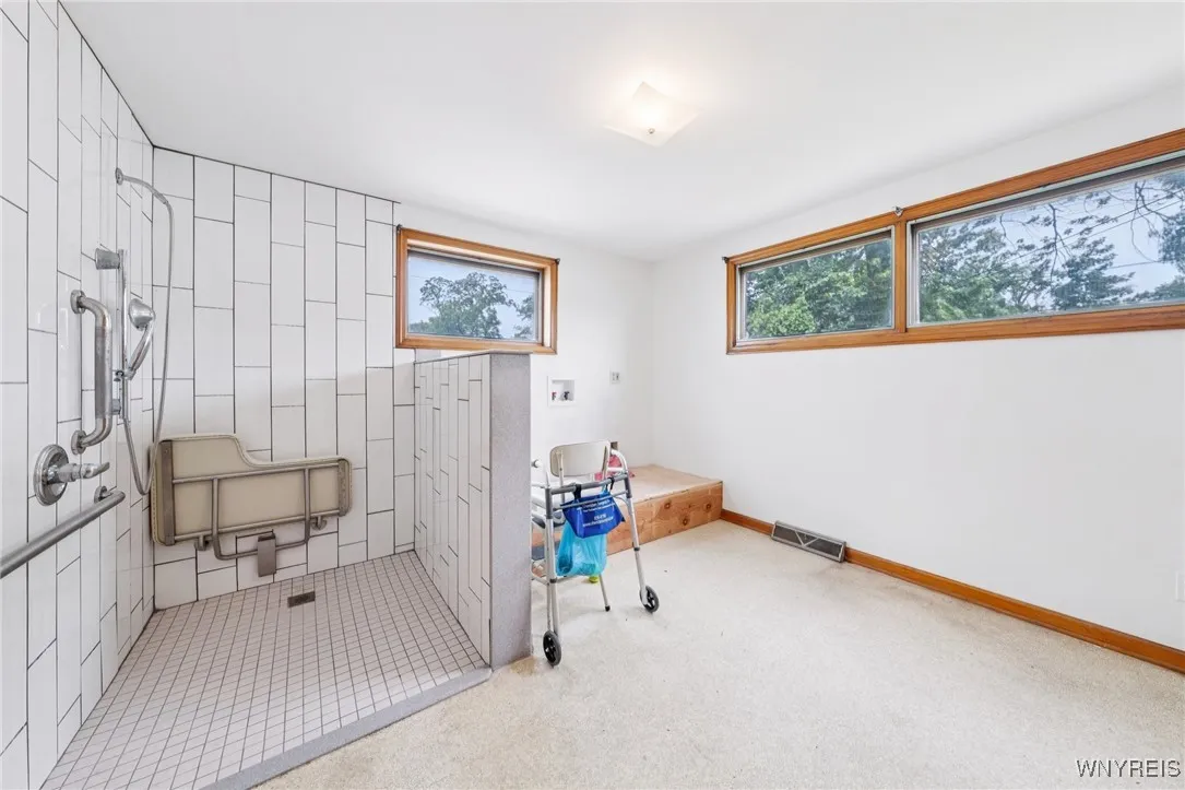 Left unit with accessible shower and washer/dryer hook ups