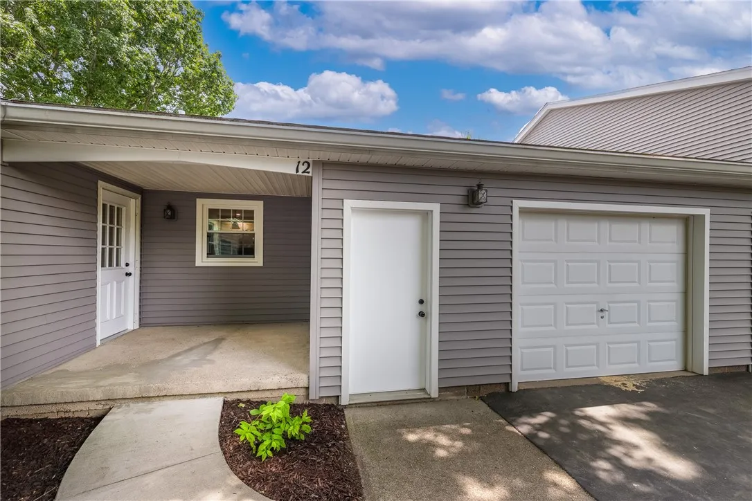 1 car attached garage with ramp