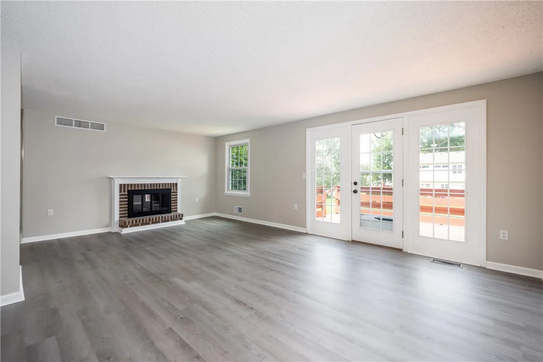 Bright and open living space - wood burning fireplace!