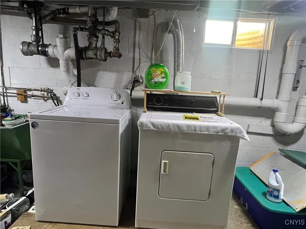 washer and dryer in basement