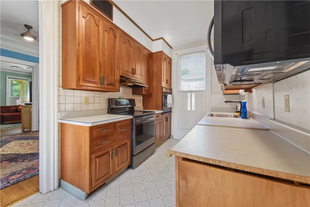 Galley Style Kitchen with New Appliances
