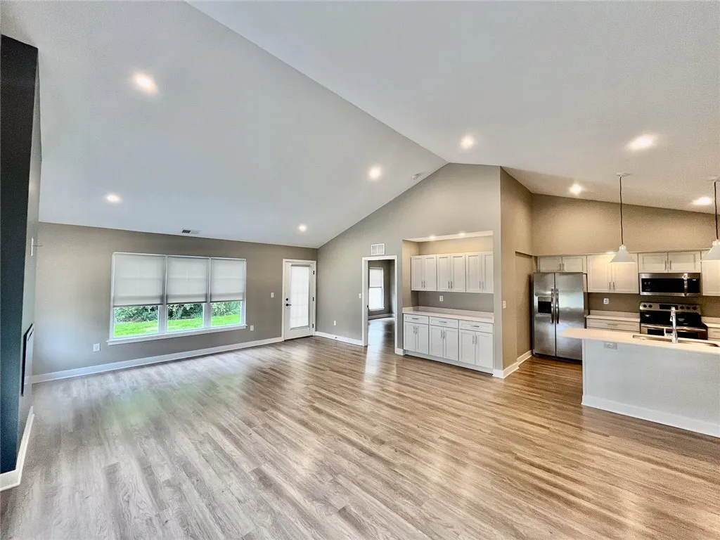 Typical Great Room with View of Coffee Bar & Kitchen