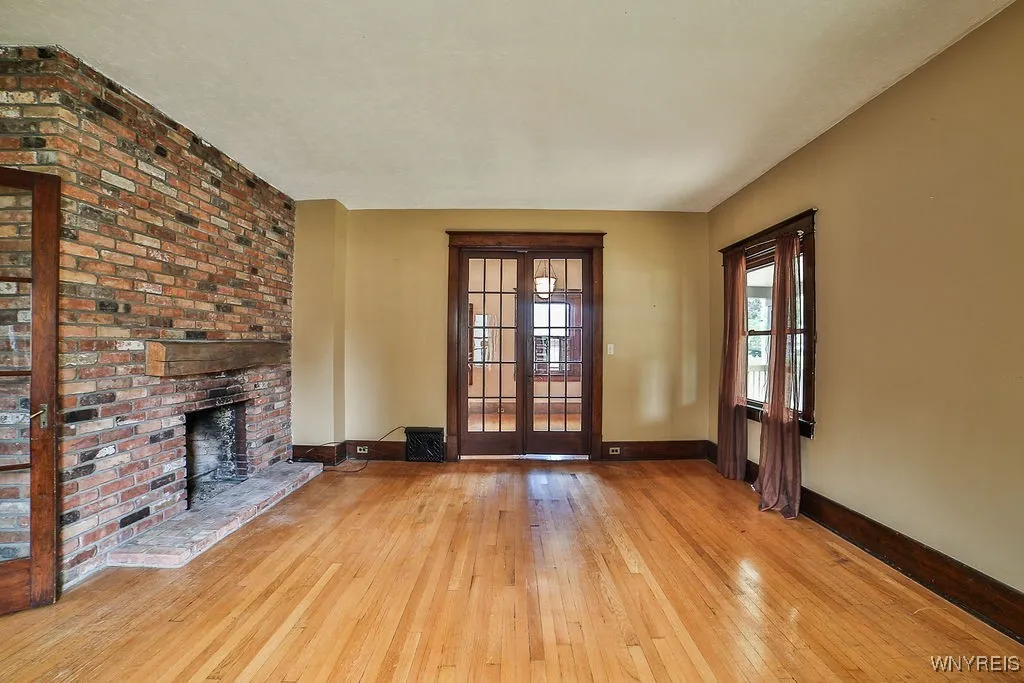 Front living room with wood burning fireplace