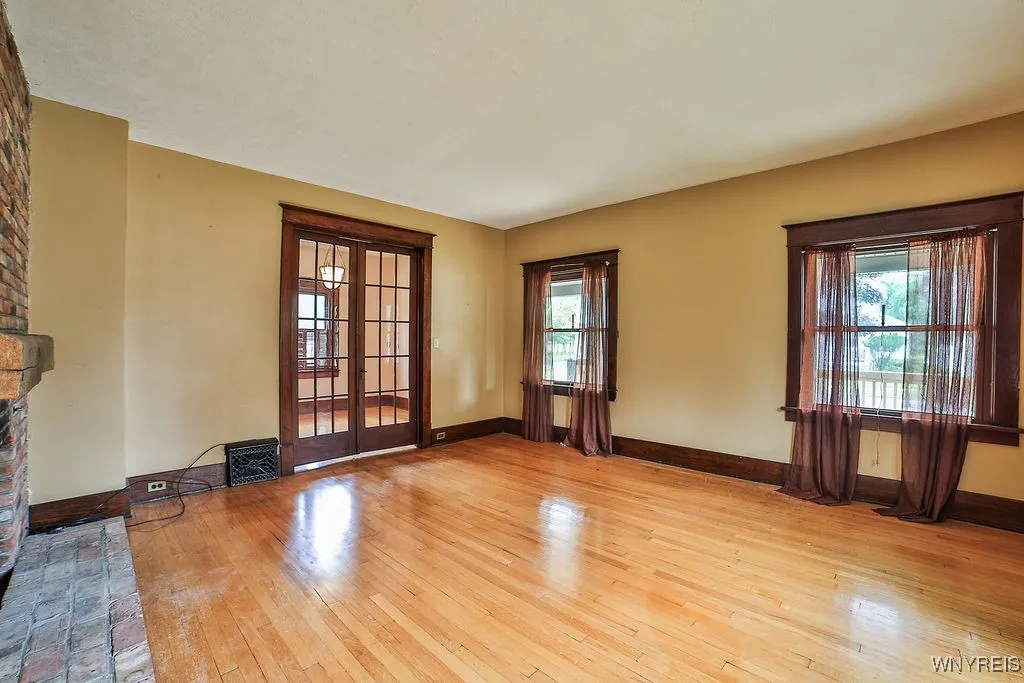 Front living room with wood burning fireplace
