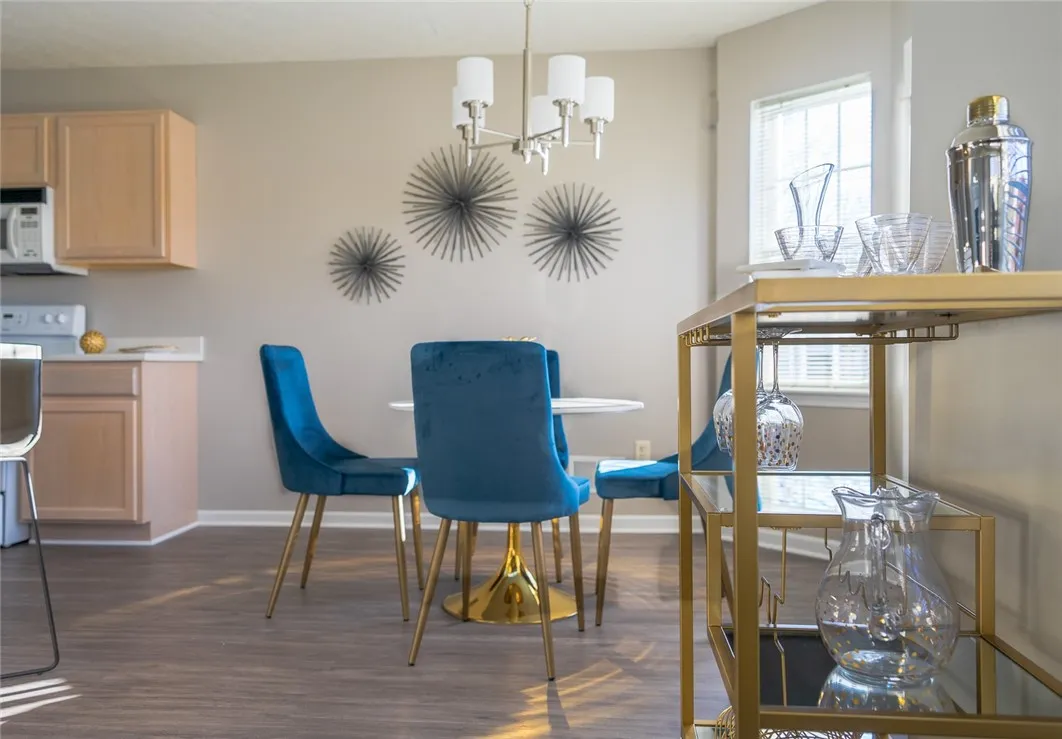 View of typical Great Room dining area and kitchen with breakfast bar