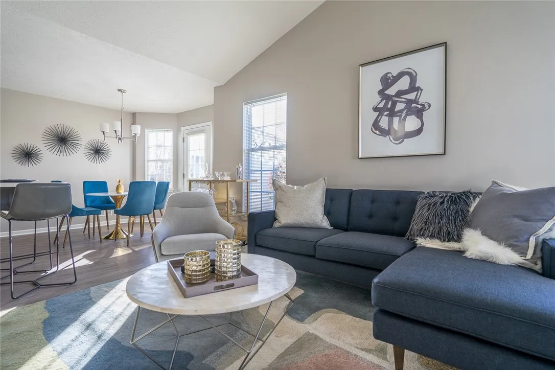 Typical Great Room with fireplace for 2-bedroom 1.5-bath ranch townhome with walkout basement