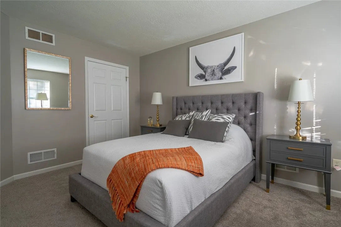Typical primary bedroom with walk-in closet