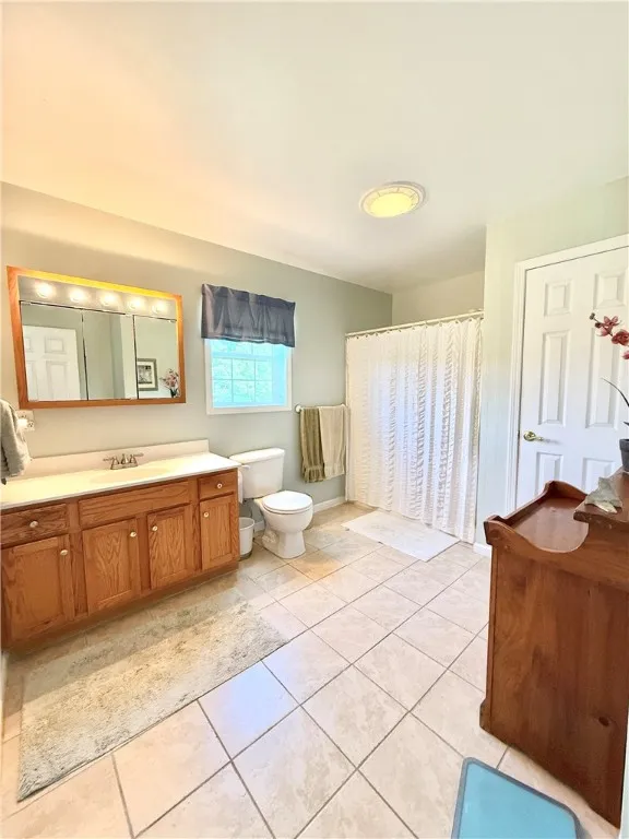 Large bathroom with wide doors and no step shower.