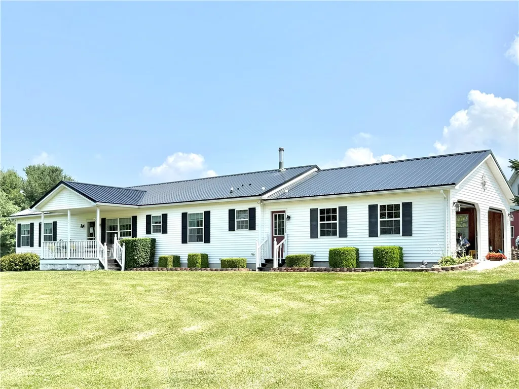 View from the driveway on south side of house.