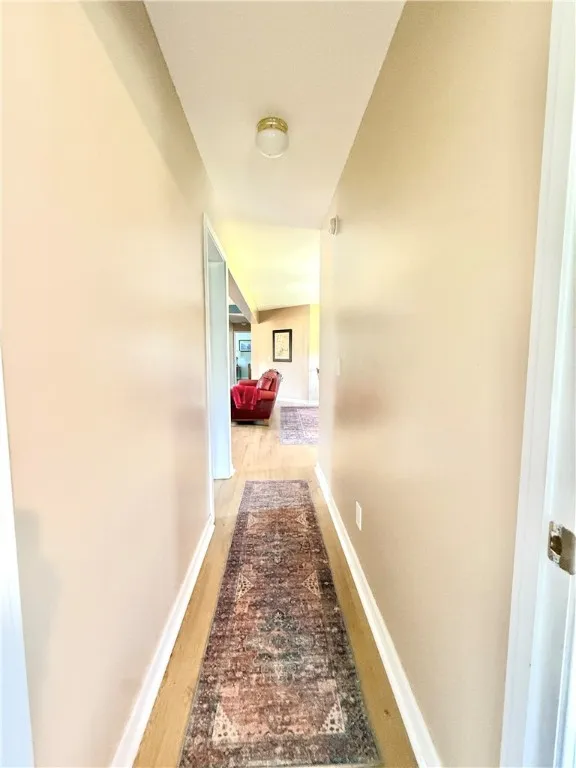 Down the wide hallway to the livingroom.