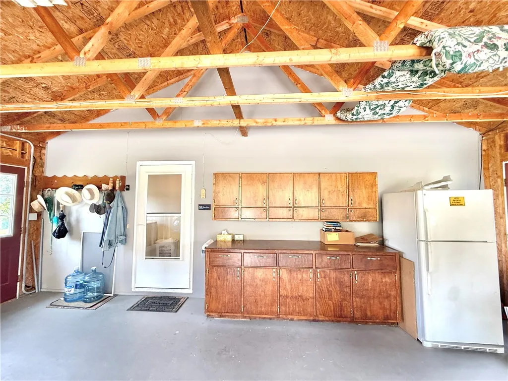 Entrance from 2 car attached garage, notice the built-ins.
