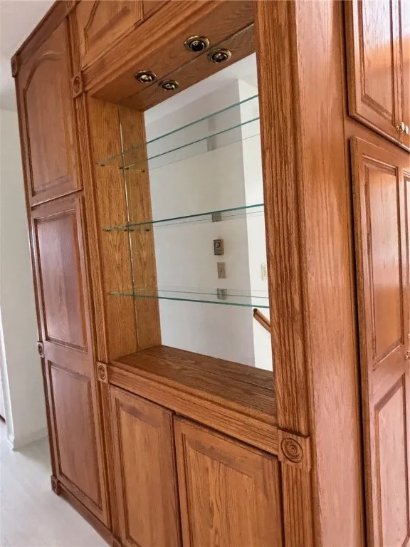 curio style cabinet with lights