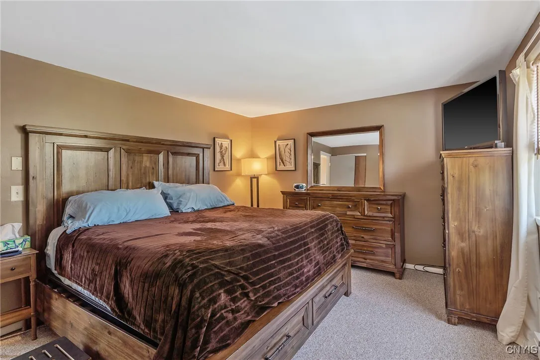 The next room upstairs is the primary suite, which is as spacious as it is cozy. No need to downsize your furniture—this spacious primary bedroom can easily handle everything from your king bed to your favorite armoire.